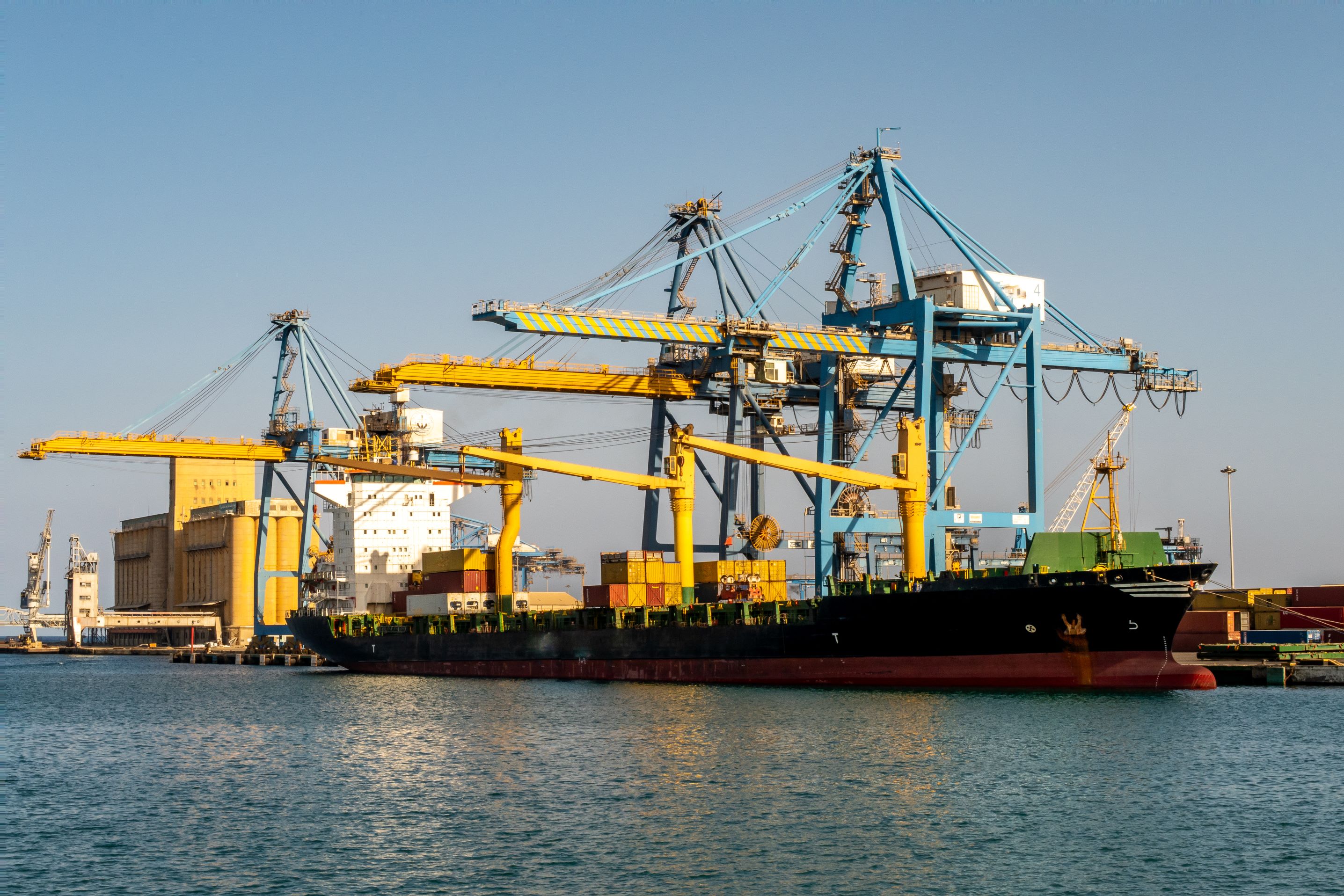 Freight ship being loaded in docks at Port Sudan, Khartoum