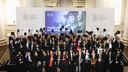 Wide shot of graduates from the class of 2025 throwing mortarboard hats into the air during Graduation and Prizegiving Ceremony 2025 