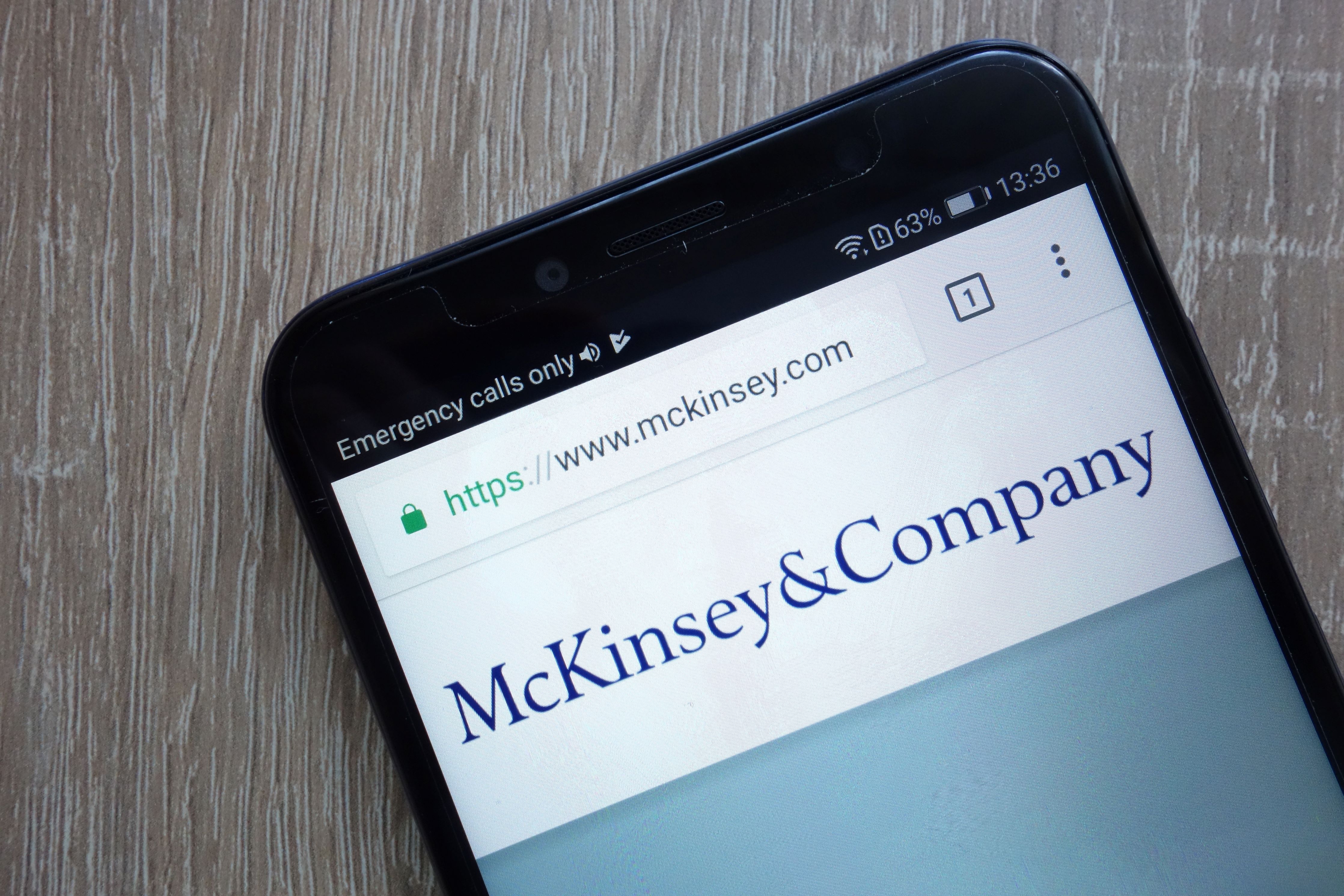 McKinsey logo shown on mobile phone