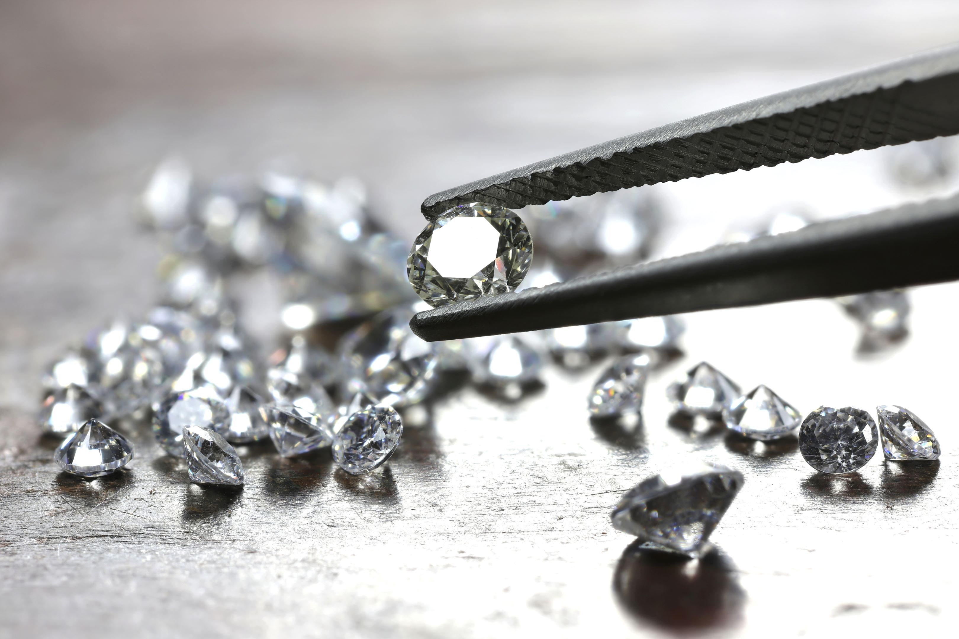 Diamonds being inspected by jeweller